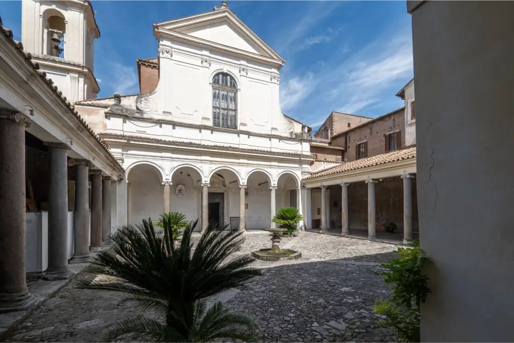 Historic courtyard and cloister of the Basilica of San Clemente near the Colosseum in Rome